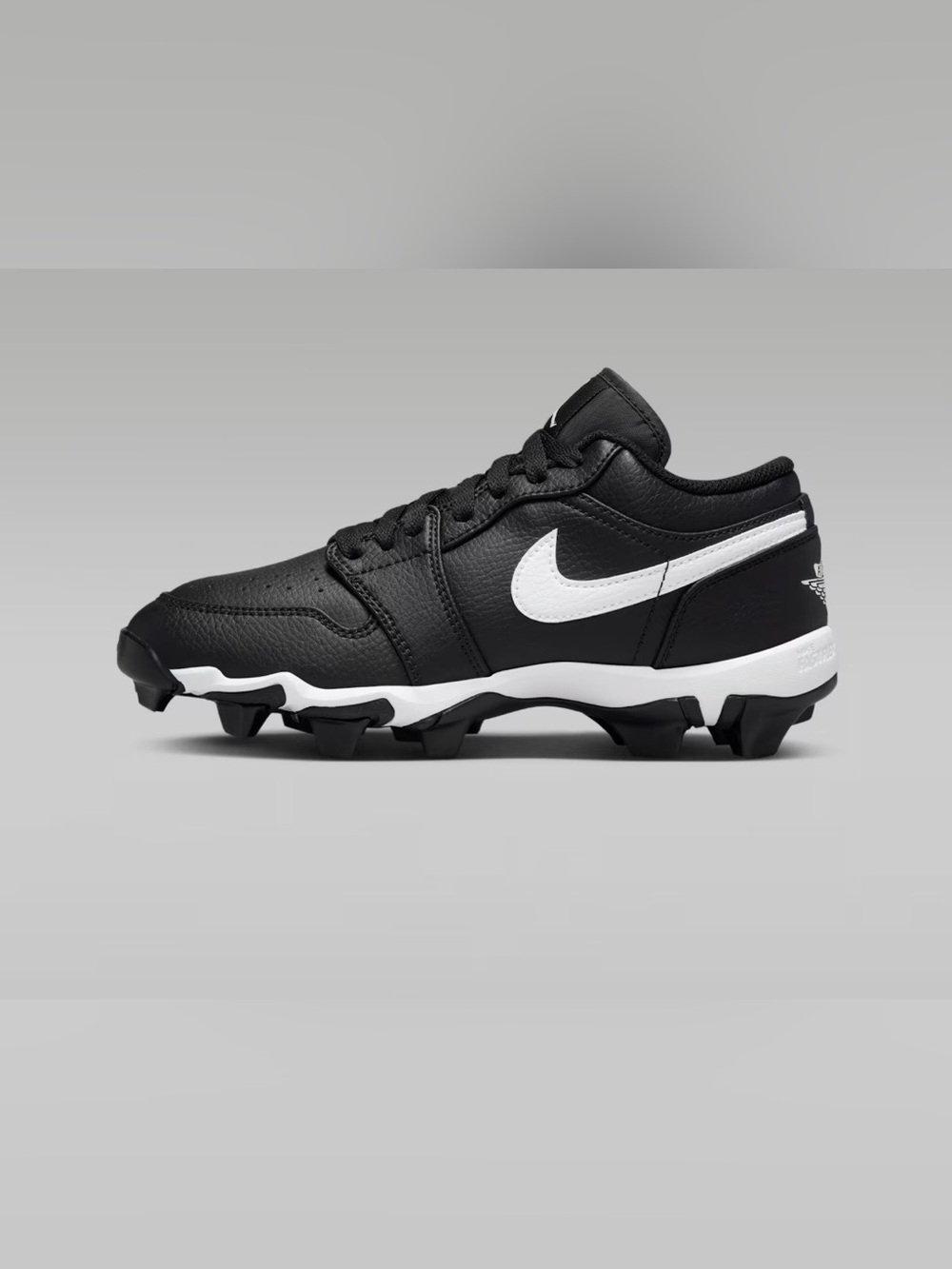 Jordan 1 low youth cleats size 5.5 black and white